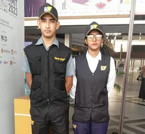 Male and female corporate security officers wearing Euro Vigil uniforms