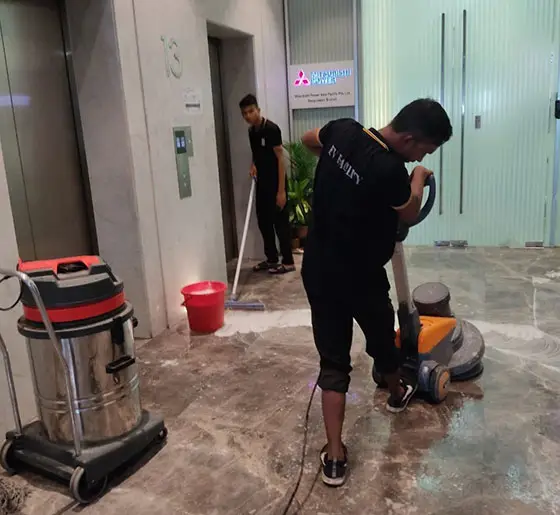 Professional floor polishing and deep cleaning teams executing corporate Facility Management Services by Euro Vigil personnel.